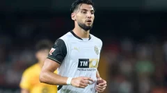 ¿Cuáles son los jugadores que vistieron la camiseta del Valencia y Sevilla?